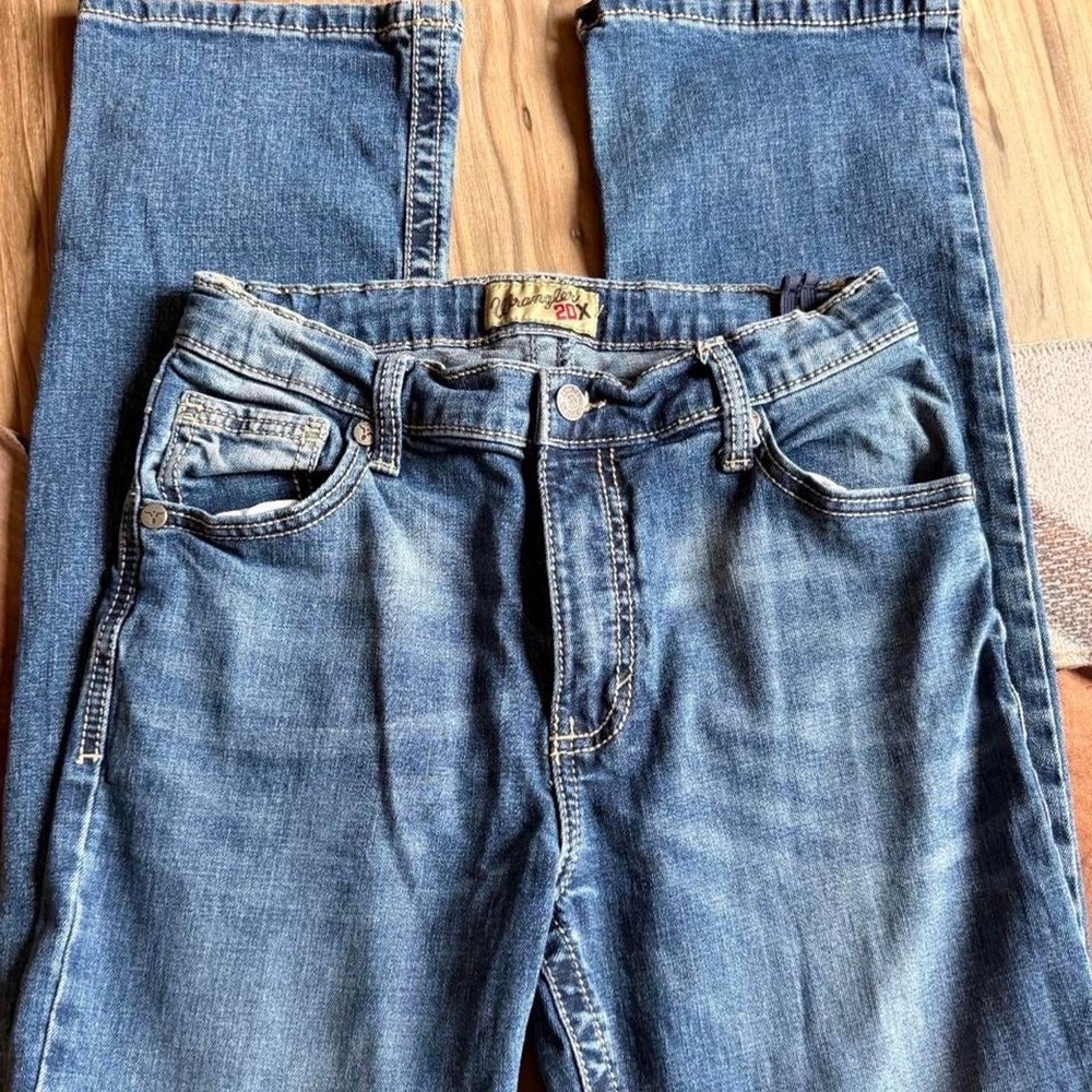 Wrangler 20x blue jeans with a 29.5" inseam